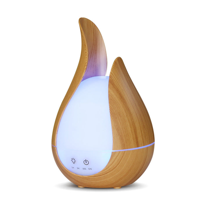 Experience Serenity with Our Aroma Humidifier Essential Oil Diffuser